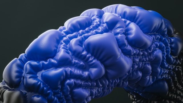 Illustration d'un cerveau lumineux montrant la neuroplasticité déclenchée par la psilocybine chez des patients parkinsoniens