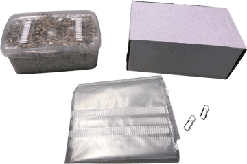 Inhoud van de GetMagic kweekset: kweekzak, growbox en twee paperclips